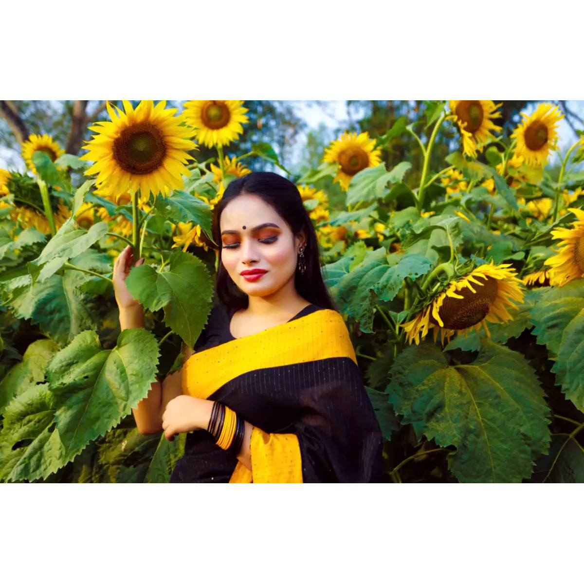 Chumki Saree BlackYellow colour Saree